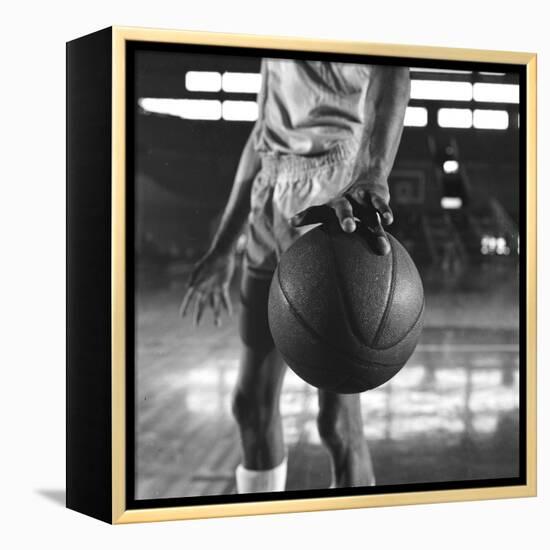 Basketball Held by Player Wilt Chamberlain, 1956-Frank Scherschel-Framed Premier Image Canvas