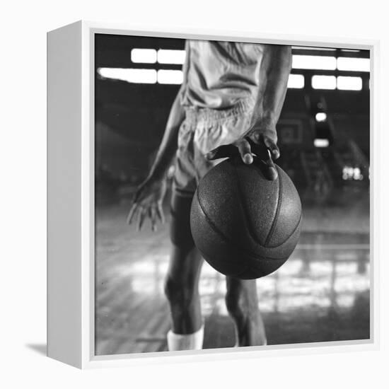 Basketball Held by Player Wilt Chamberlain, 1956-Frank Scherschel-Framed Premier Image Canvas