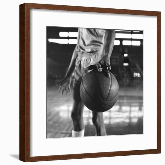 Basketball Held by Player Wilt Chamberlain, 1956-Frank Scherschel-Framed Photographic Print