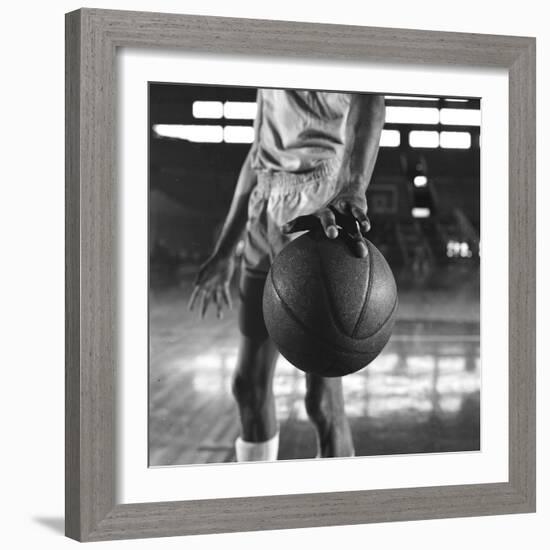 Basketball Held by Player Wilt Chamberlain, 1956-Frank Scherschel-Framed Photographic Print