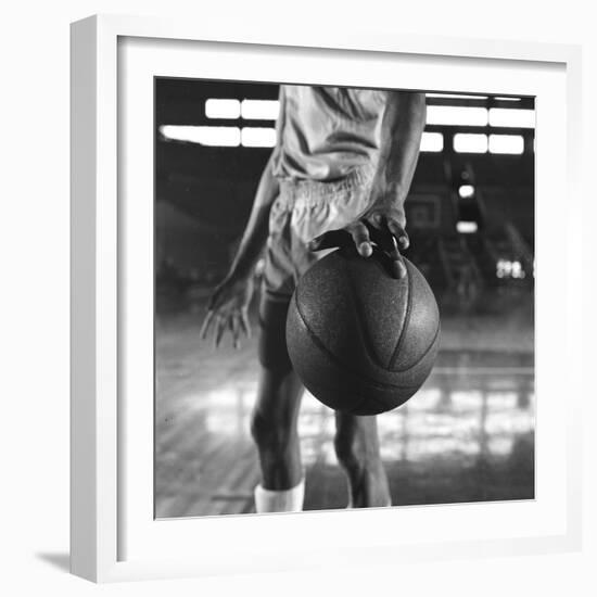 Basketball Held by Player Wilt Chamberlain, 1956-Frank Scherschel-Framed Photographic Print