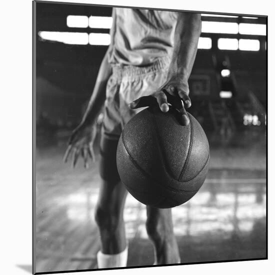 Basketball Held by Player Wilt Chamberlain, 1956-Frank Scherschel-Mounted Photographic Print