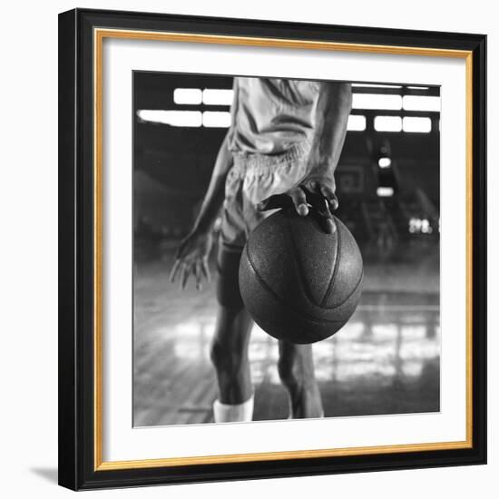Basketball Held by Player Wilt Chamberlain, 1956-Frank Scherschel-Framed Photographic Print
