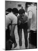 Basketball Player Tom Gola in a Huddle During a Basketball Game-null-Mounted Photographic Print