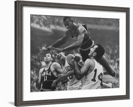 Basketball Player Wilt Chamberlain in Game Against the Celtics-George Silk-Framed Premium Photographic Print