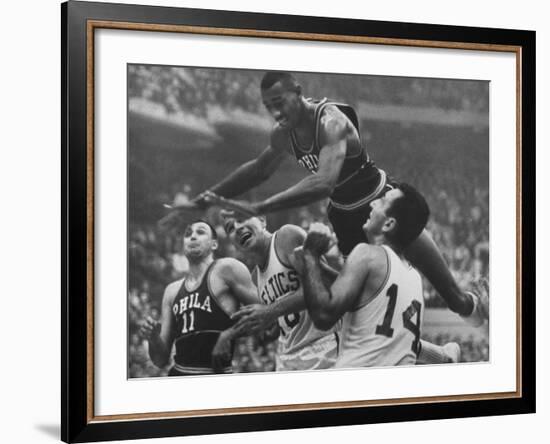 Basketball Player Wilt Chamberlain in Game Against the Celtics-George Silk-Framed Premium Photographic Print