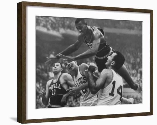 Basketball Player Wilt Chamberlain in Game Against the Celtics-George Silk-Framed Premium Photographic Print