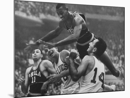 Basketball Player Wilt Chamberlain in Game Against the Celtics-George Silk-Mounted Premium Photographic Print