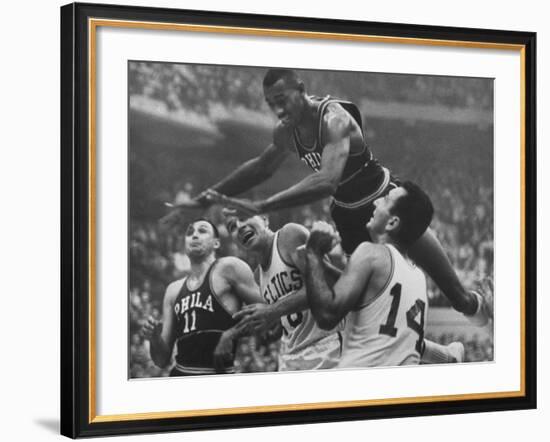 Basketball Player Wilt Chamberlain in Game Against the Celtics-George Silk-Framed Premium Photographic Print