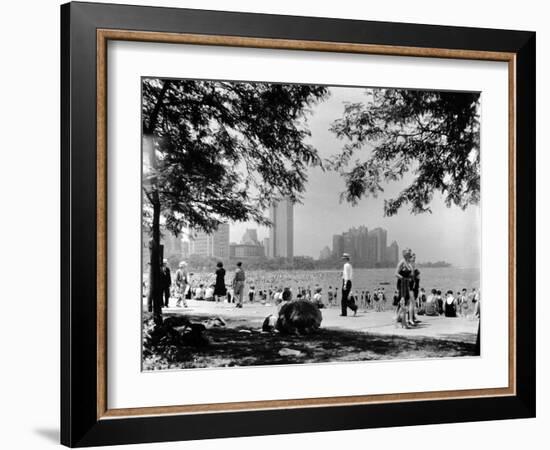 Bathers and Strollers Enjoying a Fine Day at Oak Street Beach-null-Framed Photographic Print