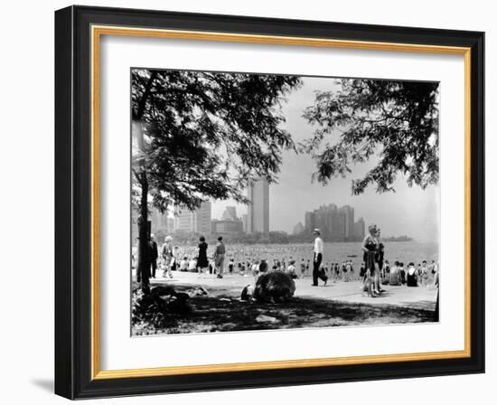 Bathers and Strollers Enjoying a Fine Day at Oak Street Beach-null-Framed Photographic Print