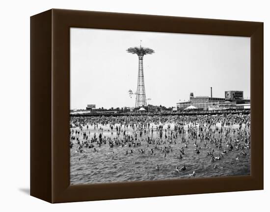 Bathers Enjoying Coney Island Beaches. Parachute Ride and Steeplechase Park Visible in the Rear-Margaret Bourke-White-Framed Premier Image Canvas