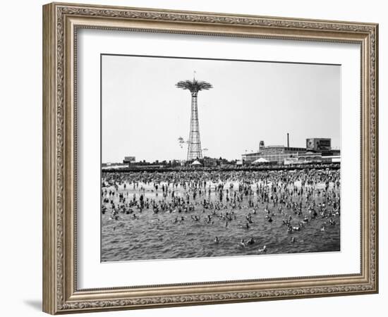 Bathers Enjoying Coney Island Beaches. Parachute Ride and Steeplechase Park Visible in the Rear-Margaret Bourke-White-Framed Premium Photographic Print