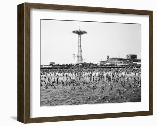 Bathers Enjoying Coney Island Beaches. Parachute Ride and Steeplechase Park Visible in the Rear-Margaret Bourke-White-Framed Premium Photographic Print