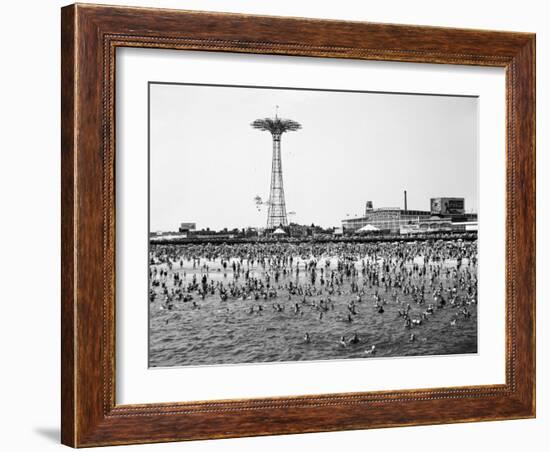 Bathers Enjoying Coney Island Beaches. Parachute Ride and Steeplechase Park Visible in the Rear-Margaret Bourke-White-Framed Premium Photographic Print