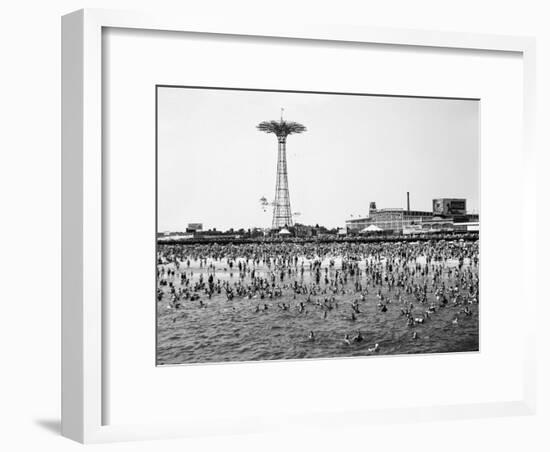 Bathers Enjoying Coney Island Beaches. Parachute Ride and Steeplechase Park Visible in the Rear-Margaret Bourke-White-Framed Premium Photographic Print