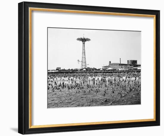 Bathers Enjoying Coney Island Beaches. Parachute Ride and Steeplechase Park Visible in the Rear-Margaret Bourke-White-Framed Premium Photographic Print