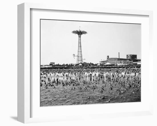 Bathers Enjoying Coney Island Beaches. Parachute Ride and Steeplechase Park Visible in the Rear-Margaret Bourke-White-Framed Premium Photographic Print