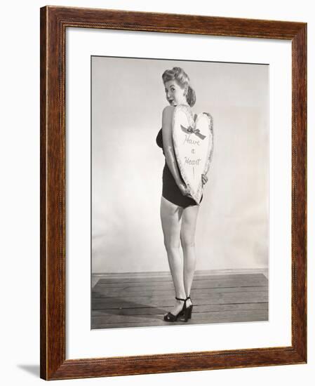 Bathing Beauty Holding Heart-Shaped Sign-null-Framed Photo