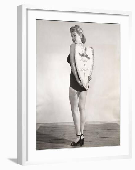 Bathing Beauty Holding Heart-Shaped Sign-null-Framed Photo