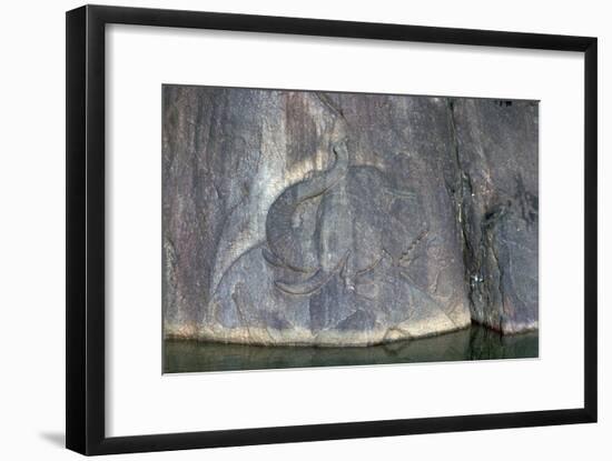 Bathing elephant carved in low relief in a Buddhist shrine. Artist: Unknown-Unknown-Framed Giclee Print