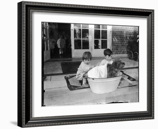 Bathing the Dog-null-Framed Photographic Print