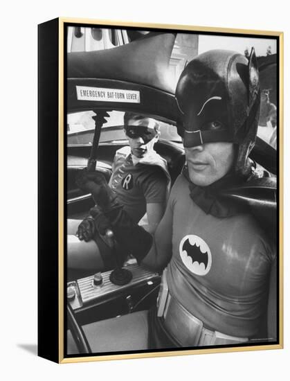 Batman Adam West and "Robin" Burt Ward in Bat Mobile, on Set During Shooting of Scene-Yale Joel-Framed Premier Image Canvas