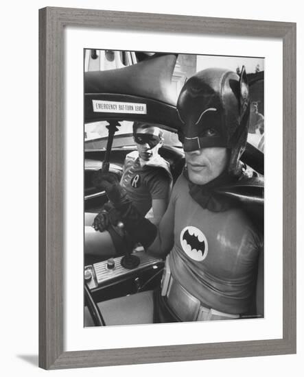 Batman Adam West and "Robin" Burt Ward in Bat Mobile, on Set During Shooting of Scene-Yale Joel-Framed Premium Photographic Print