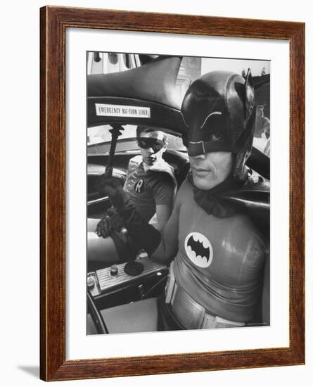 Batman Adam West and "Robin" Burt Ward in Bat Mobile, on Set During Shooting of Scene-Yale Joel-Framed Premium Photographic Print