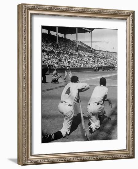 Batter Getting Ready for Pitch While Other Players are Waiting their Turn to Bat-Allan Grant-Framed Photographic Print