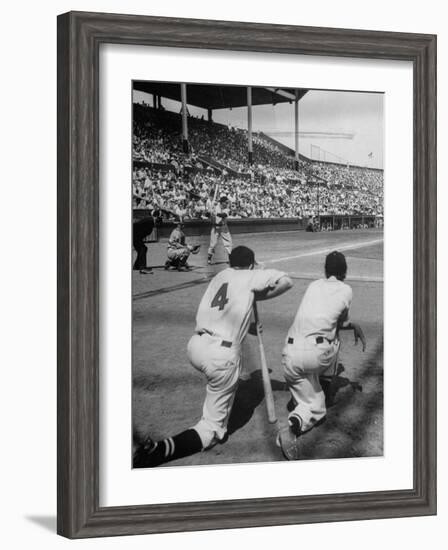 Batter Getting Ready for Pitch While Other Players are Waiting their Turn to Bat-Allan Grant-Framed Photographic Print
