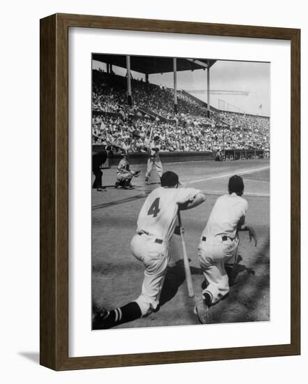 Batter Getting Ready for Pitch While Other Players are Waiting their Turn to Bat-Allan Grant-Framed Photographic Print