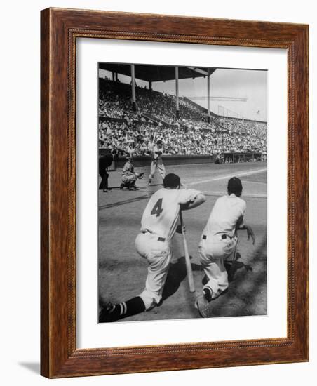 Batter Getting Ready for Pitch While Other Players are Waiting their Turn to Bat-Allan Grant-Framed Photographic Print