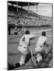 Batter Getting Ready for Pitch While Other Players are Waiting their Turn to Bat-Allan Grant-Mounted Photographic Print