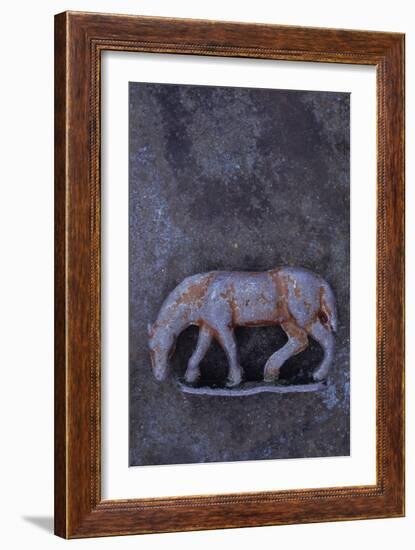 Battered Lead Model of Grazing Horse Lying on Tarnished Metal-Den Reader-Framed Photographic Print