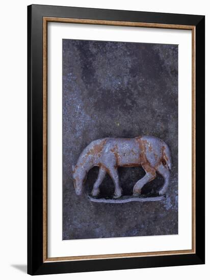 Battered Lead Model of Grazing Horse Lying on Tarnished Metal-Den Reader-Framed Photographic Print