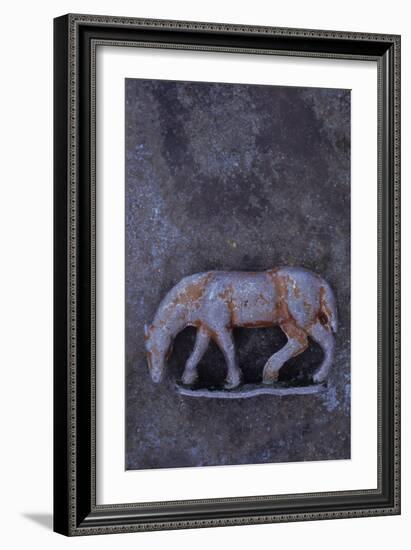 Battered Lead Model of Grazing Horse Lying on Tarnished Metal-Den Reader-Framed Photographic Print