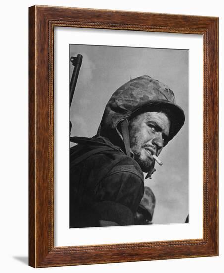 Battle Weary, Cigarette Smoking Marine on Saipan During Fight to Wrest the Island from Japanese-W^ Eugene Smith-Framed Photographic Print