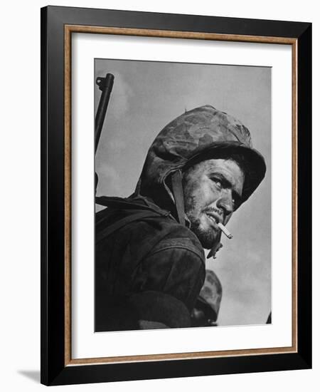 Battle Weary, Cigarette Smoking Marine on Saipan During Fight to Wrest the Island from Japanese-W^ Eugene Smith-Framed Photographic Print