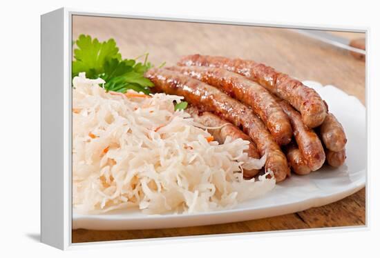 Bavarian Fried Sausages on Sauerkraut-Timolina-Framed Premier Image Canvas