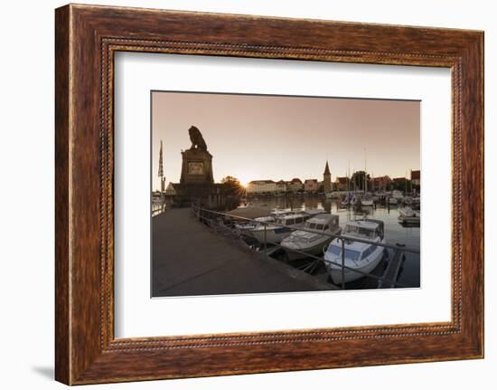 Bavarian Lion and Mangturm at the port at sunset, Lindau, Lake Constance, Bavaria, Germany, Europe-Markus Lange-Framed Photographic Print