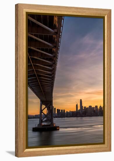 Bay Bridge from Treasure Island at sunset with colorful clouds over San Francisco skyline-David Chang-Framed Premier Image Canvas