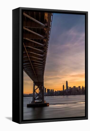 Bay Bridge from Treasure Island at sunset with colorful clouds over San Francisco skyline-David Chang-Framed Premier Image Canvas