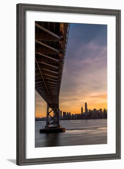 Bay Bridge from Treasure Island at sunset with colorful clouds over San Francisco skyline-David Chang-Framed Premium Photographic Print