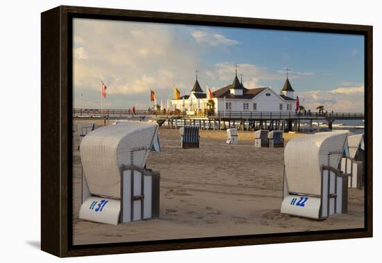 Beach Chairs and the Historic Pier in Ahlbeck on the Island of Usedom-Miles Ertman-Framed Premier Image Canvas