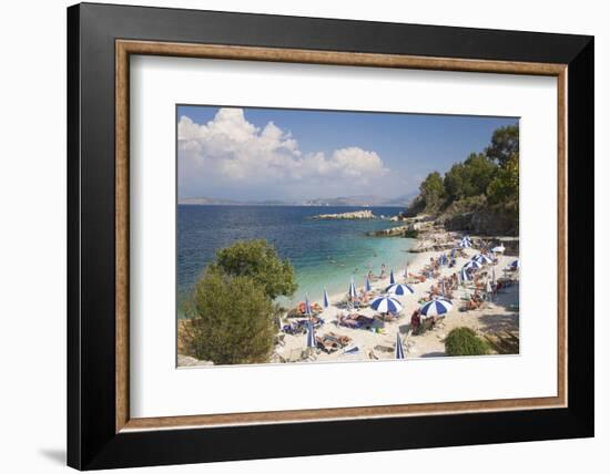 Beach Crowded with Holidaymakers, Kassiopi, Corfu, Ionian Islands, Greek Islands, Greece, Europe-Ruth Tomlinson-Framed Photographic Print