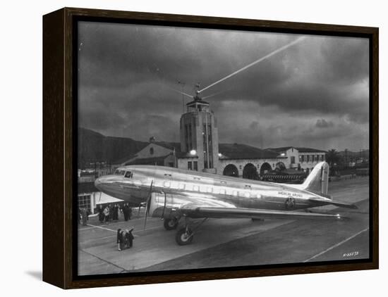 Beacon Shining Forth at Evening from Air Terminal Tower, American Airlines Plane in Foreground-null-Framed Premier Image Canvas