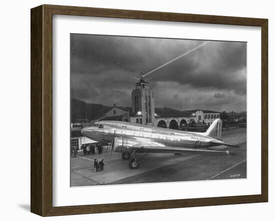 Beacon Shining Forth at Evening from Air Terminal Tower, American Airlines Plane in Foreground-null-Framed Premium Photographic Print