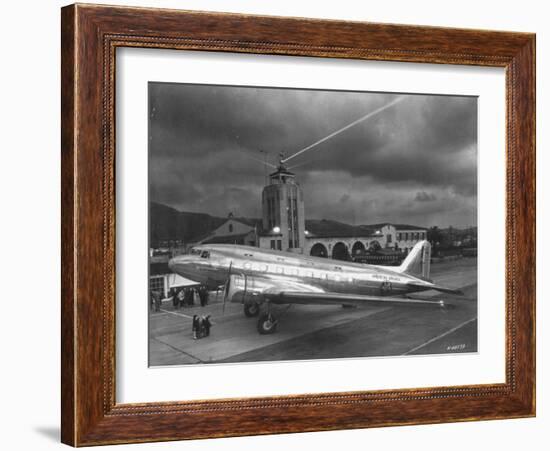 Beacon Shining Forth at Evening from Air Terminal Tower, American Airlines Plane in Foreground-null-Framed Premium Photographic Print