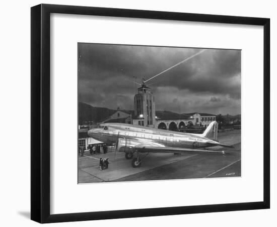 Beacon Shining Forth at Evening from Air Terminal Tower, American Airlines Plane in Foreground-null-Framed Premium Photographic Print